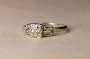 Late 1930s Palladium and 18k Old European Cut Diamond Engagement Ring with Geometric Baguette Accents