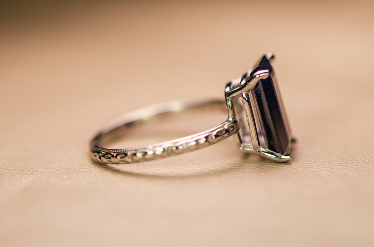 Art Deco Platinum 3.35 CT Emerald Cut Sapphire Ring with Milgrain and Raised Floral Eternity Shank