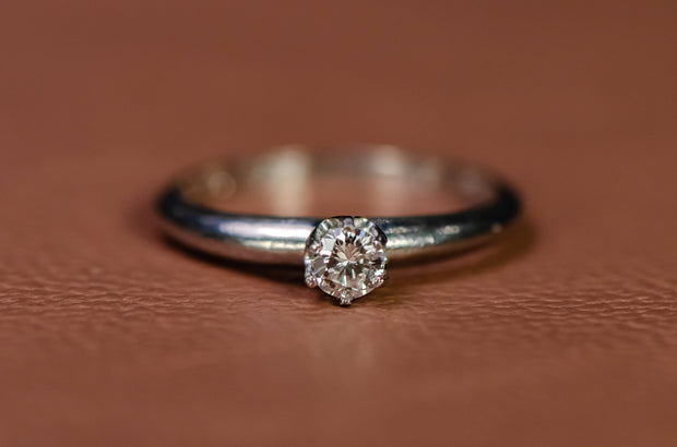1950s Tiffany and Co. Platinum 0.17 CT G/VS1 Diamond Engagement Ring in Iconic Low Profile Crown Basket Setting