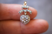 Victorian Revival 9k 0.20 CTW Diamond and Pearl Bow Topped Heart Pendant with Silver Face