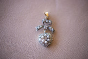 Victorian Revival 9k 0.20 CTW Diamond and Pearl Bow Topped Heart Pendant with Silver Face