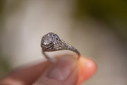 Edwardian 18k 0.60 CT Icy White Speckled Old European Cut Diamond Engagement Ring in Webbed Floral Filigree Mount