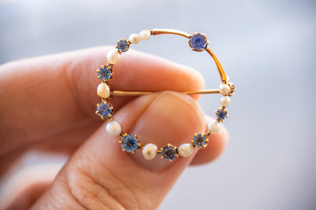 Victorian 14k Faceted Cornflower Blue Sapphire and Semi-Baroque Seed Pearl Crescent Moon Circle Brooch