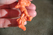 Mid Victorian 1860s 198.8 CT Hand Carved Coral Swaddled Putto Brooch