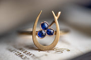 Late Victorian 14k 0.23 CTW Royal Blue Sapphire Lucky Horseshoe and Shamrock Ring