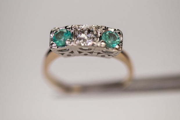 Late 1930s 14k 1.19 CTW Diamond and Emerald Three Stone Ring in Two Tone Art Deco Geometric Mounting