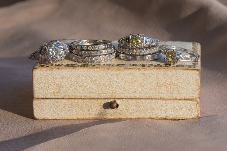 Art Deco Platinum 0.80 CTW Mixed Old Cut Diamond Eternity Band with Articulated and Engraved Octagonal Mounts