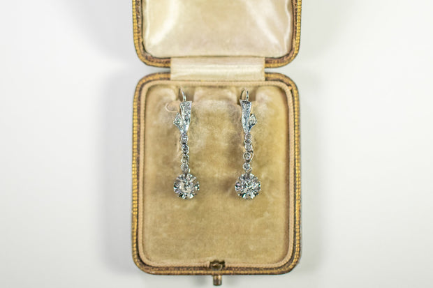 1940s Platinum 0.88 CTW Diamond Buttercup Drop Earrings with Ribbon Motif