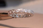 Art Deco Platinum 0.80 CTW Mixed Old Cut Diamond Eternity Band with Articulated and Engraved Octagonal Mounts