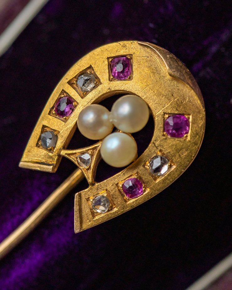 French Victorian 18k 0.90 CTW Rose Cut Diamond and Ruby Horseshoe Stick Pin with Pearl Shamrock Center